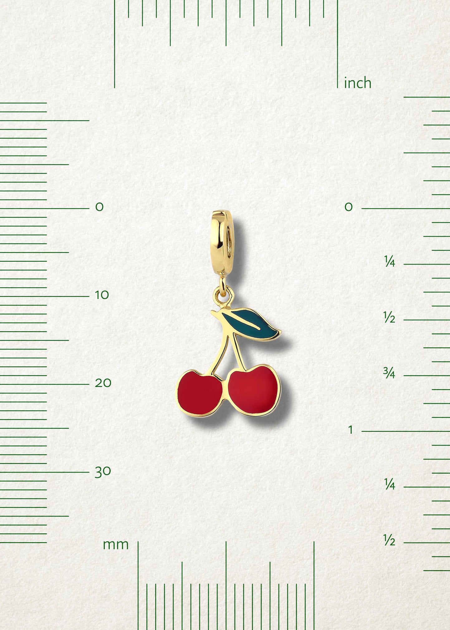 Size view of Cherry on Top Charm by whywhy NYC, 14K gold and red enamel, approx. 24mm length.