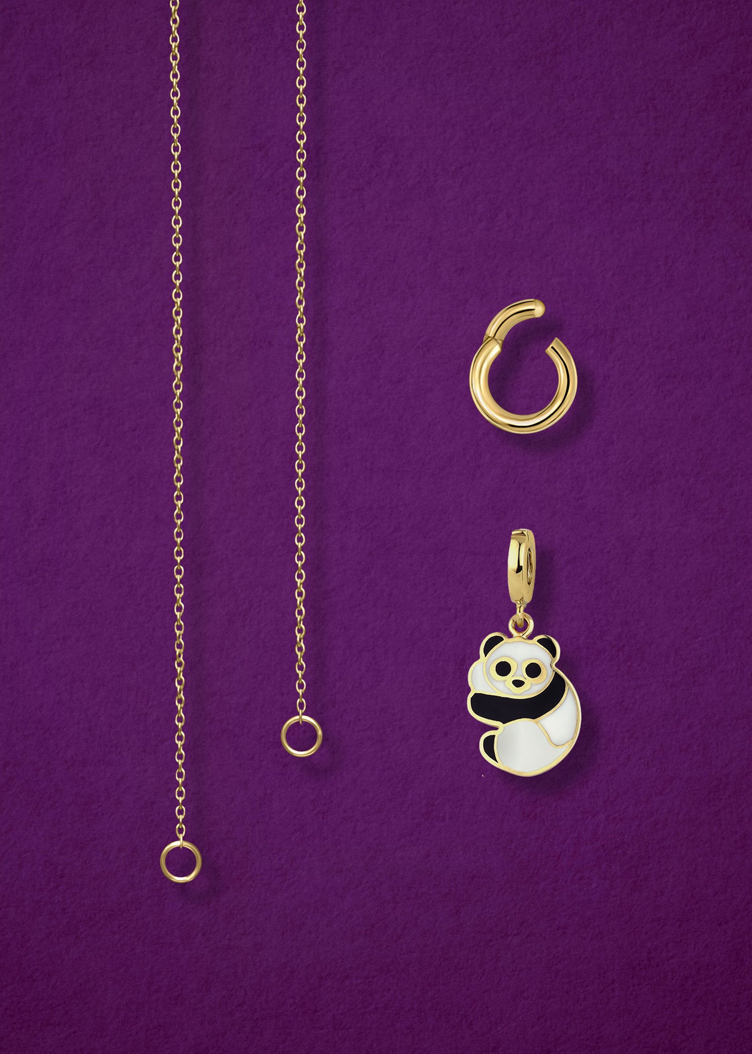 Close-up of the separated Golden Grace Panda Pals Charm Necklace components: 14K solid gold cable chain, golden link charm holder, and panda pals charm with black and white enamel by whywhy NYC.