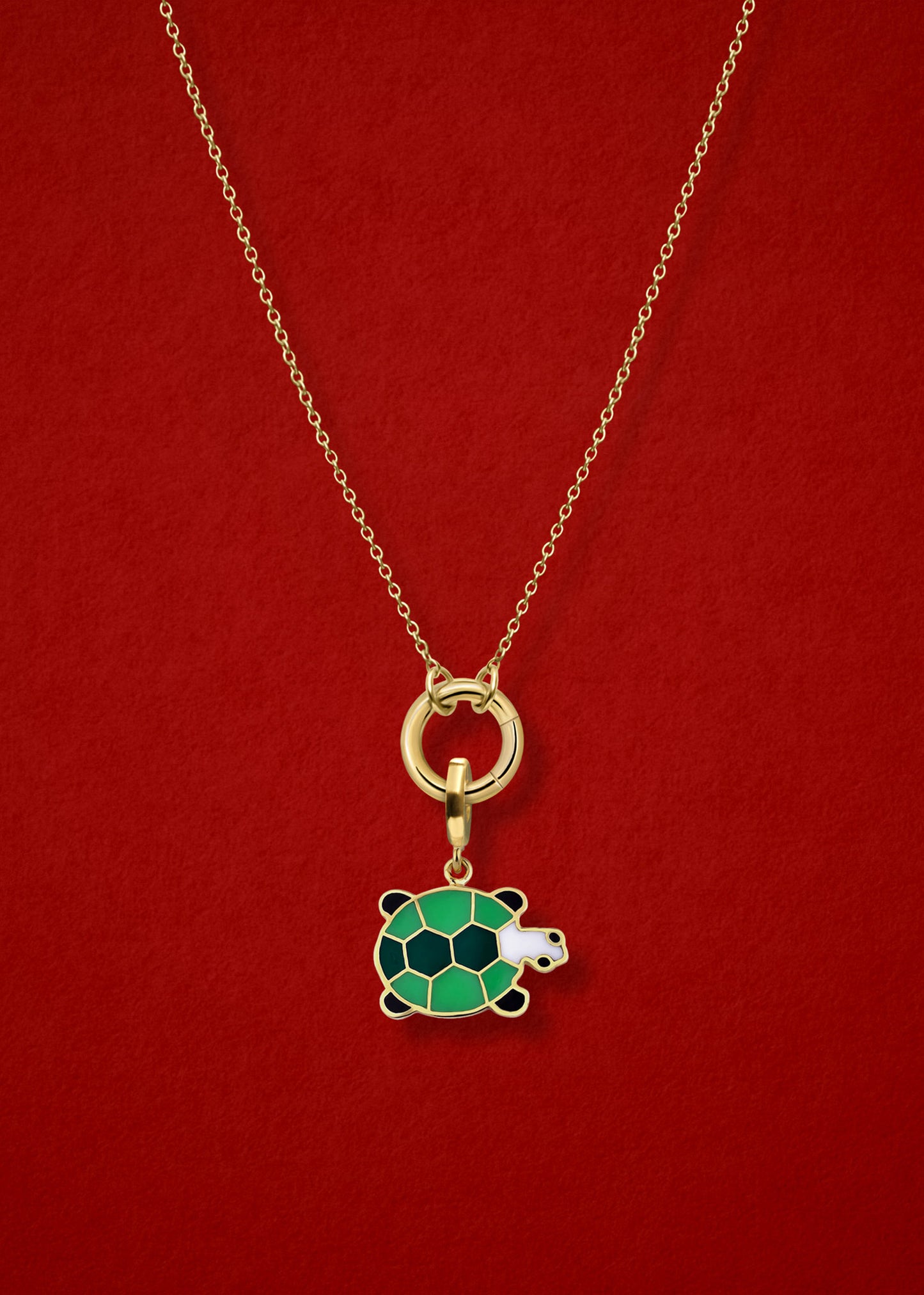 Close-up of the Turtle Treasure Charm paired with the Golden Grace Cable Chain, crafted in 14K solid gold by whywhy NYC, for a meaningful and playful jewelry design.