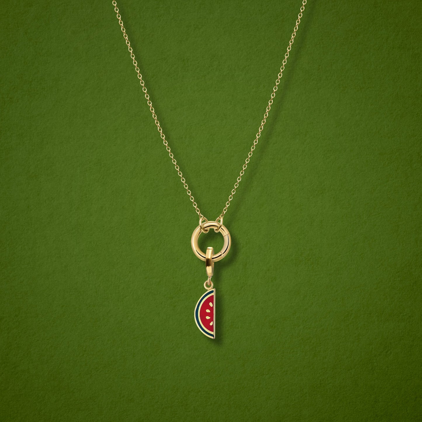 Close-up of the Watermelon Wonder Charm paired with the Golden Grace Cable Chain, crafted in 14K solid gold by whywhy NYC, for a fresh and playful jewelry look.
