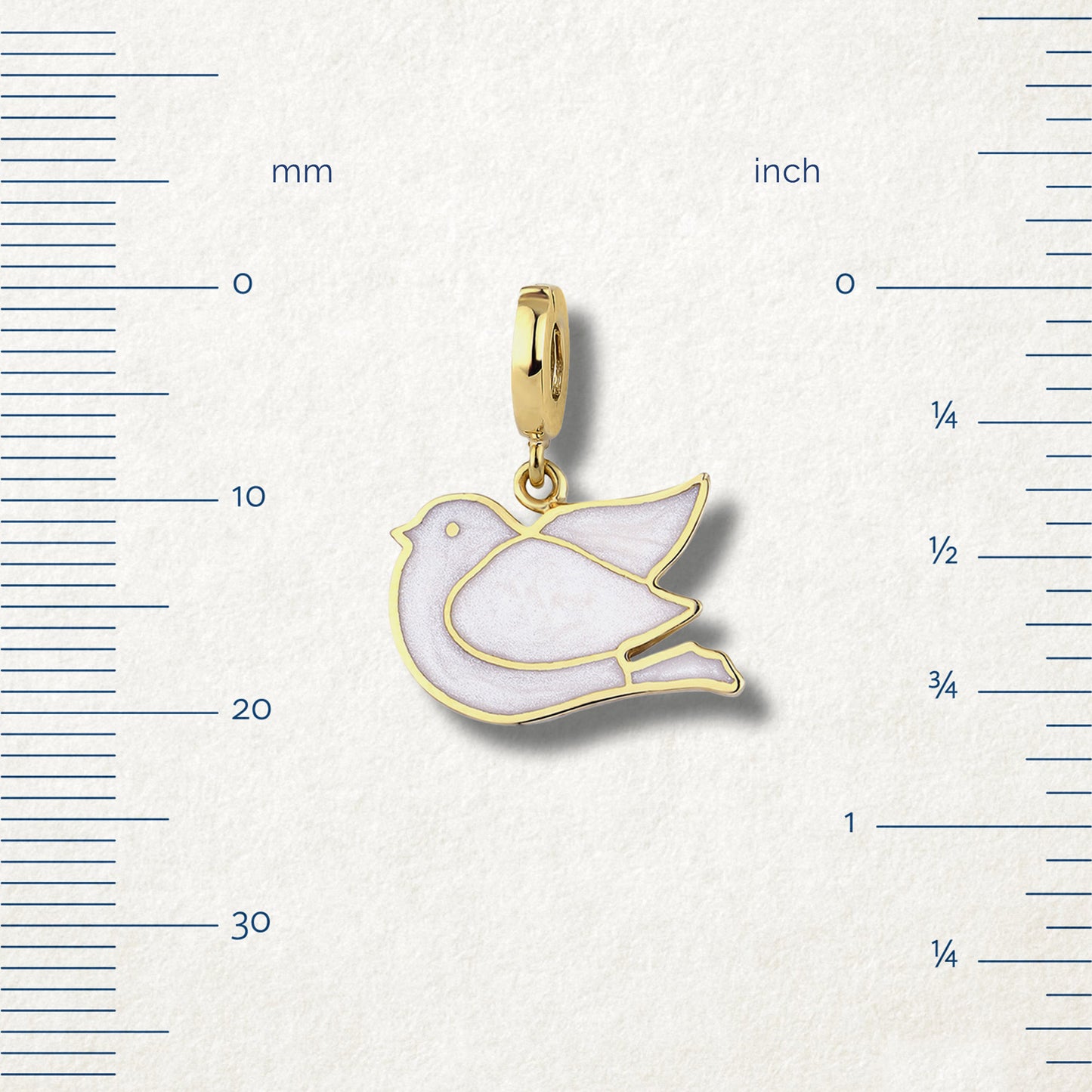 Measurement view of Dove of Hope Charm by whywhy NYC, 14K solid gold with white enamel, approximately 20mm in length.
