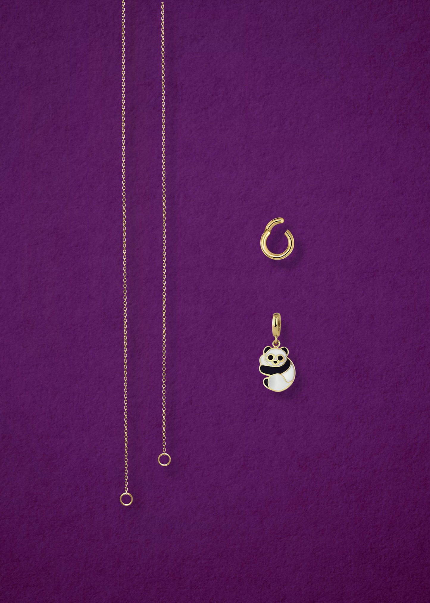Separated components of the Golden Grace Panda Pals Charm Necklace, including 14K solid gold cable chain, golden link charm holder, and panda pals charm with black and white enamel by whywhy NYC.