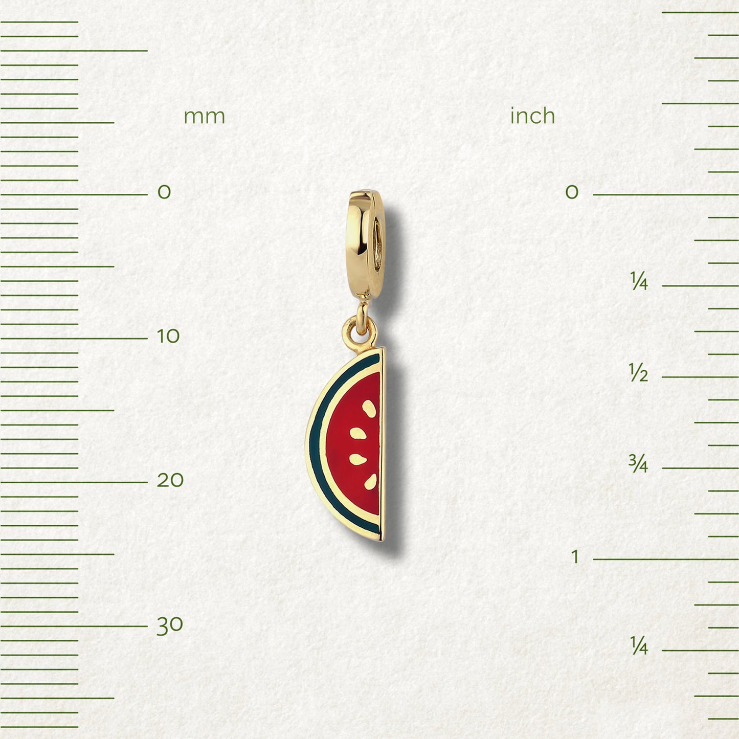 Measurement view of Watermelon Wonder Charm by whywhy NYC, 14K gold and enamel, approx. 25mm length.