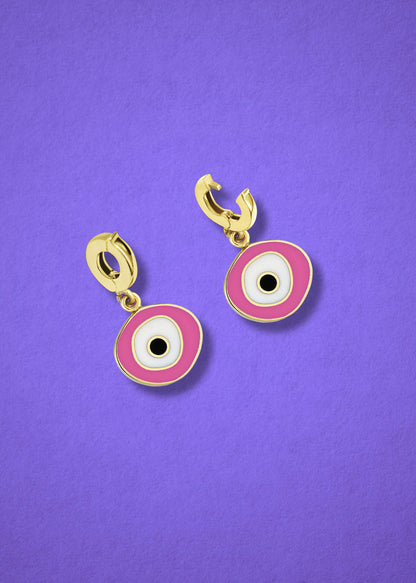 Clip-on bail of the 14K solid gold Blush Organic Evil Eye Charm shown in open and closed view on a lilac background.
