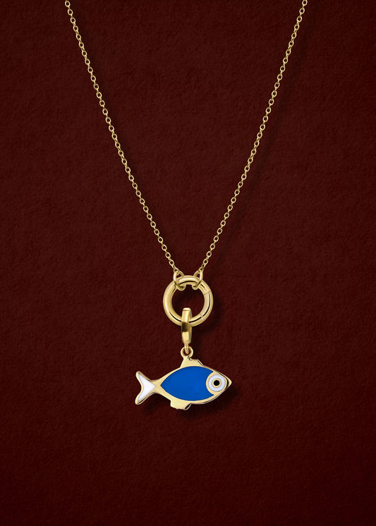 Close-up of the Golden Grace Fishy Wishes Charm Necklace, featuring a 14K solid gold cable chain, a golden charm holder, and a fishy wishes charm with vibrant enamel by whywhy NYC.