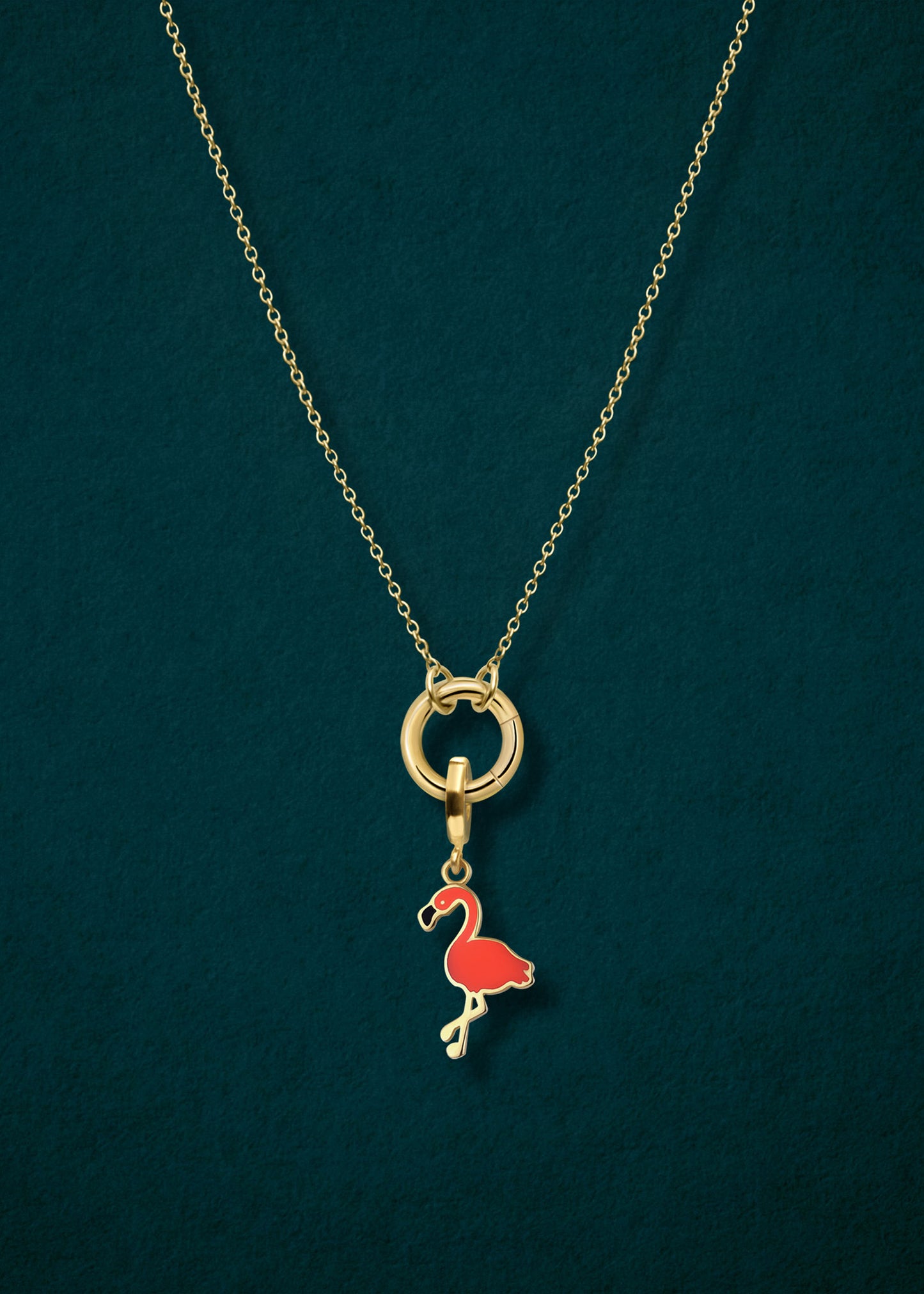 Close-up of the Golden Grace Cable Chain paired with the Flamingo Flair Charm by whywhy NYC, featuring sleek 14K solid gold and bold enamel for a tropical, playful touch.