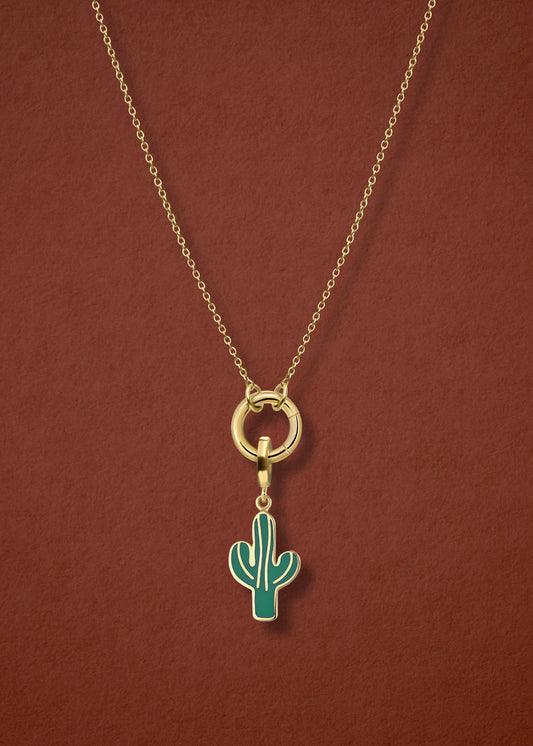 Close-up of the Golden Grace Desert Bloom Charm Necklace, featuring a 14K solid gold cable chain, a golden link charm holder, and a desert bloom charm with green enamel by whywhy NYC.