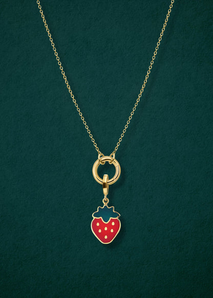 Close-up of the Golden Grace Sweet Strawberry Charm Necklace, featuring a 14K solid gold cable chain, a golden link charm holder, and a sweet strawberry charm with red enamel by whywhy NYC.