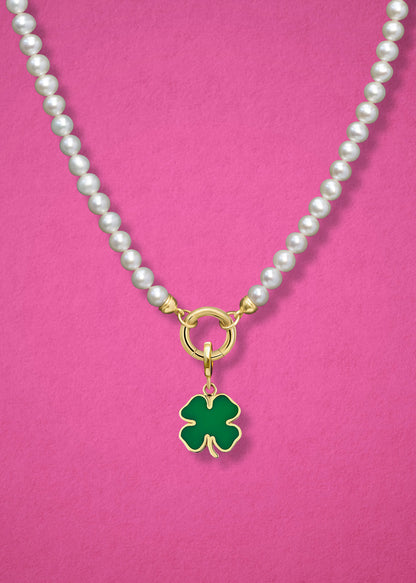 Close-up of the Lucky Clover Charm paired with the Lustrous Pearl Charm Necklace by whywhy NYC, featuring 14K solid gold and freshwater pearls for a timeless, elegant style.