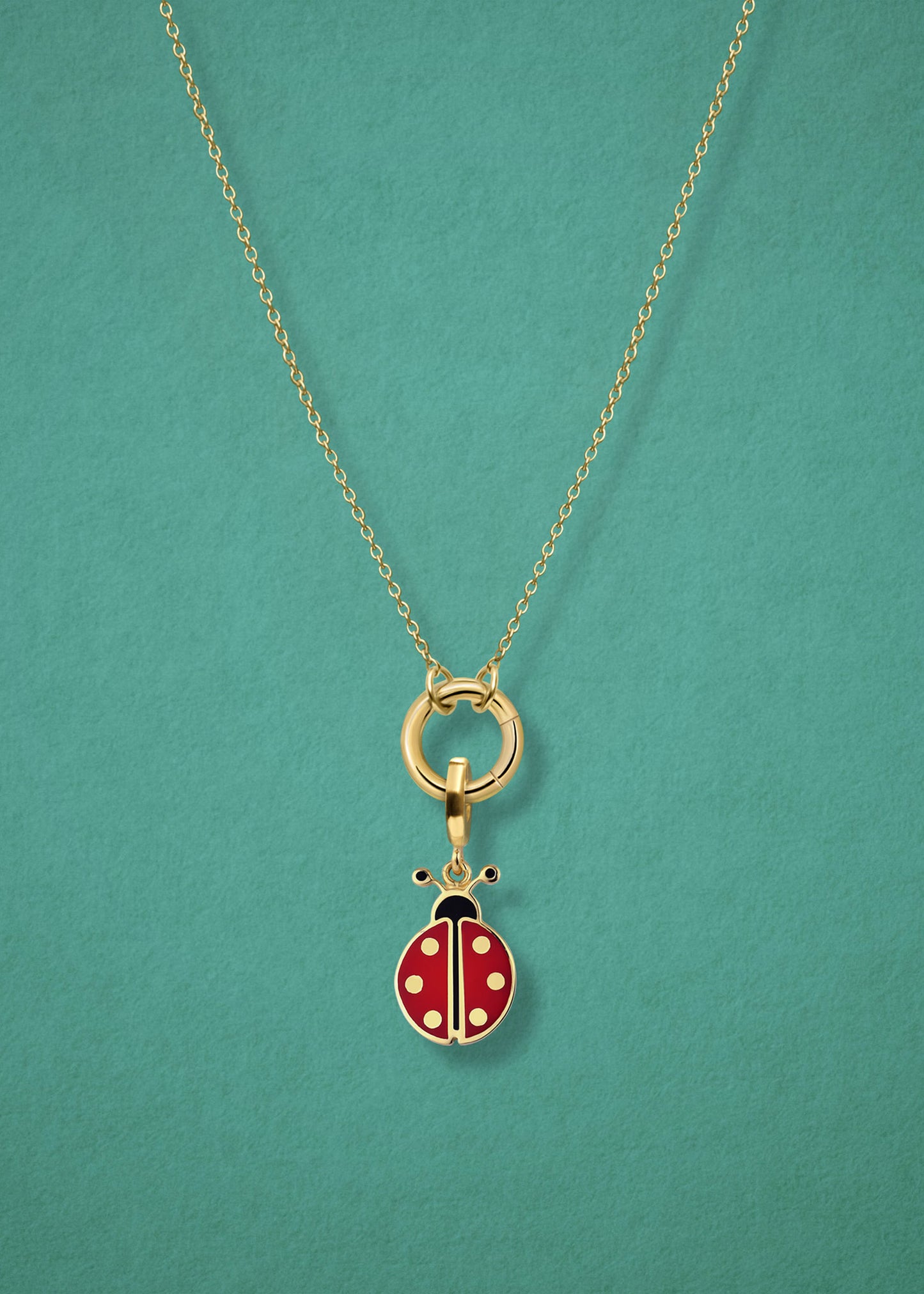 Close-up of the Lucky Ladybird Charm paired with the Golden Grace Cable Chain, crafted in 14K solid gold by whywhy NYC, for a playful and stylish jewelry option.