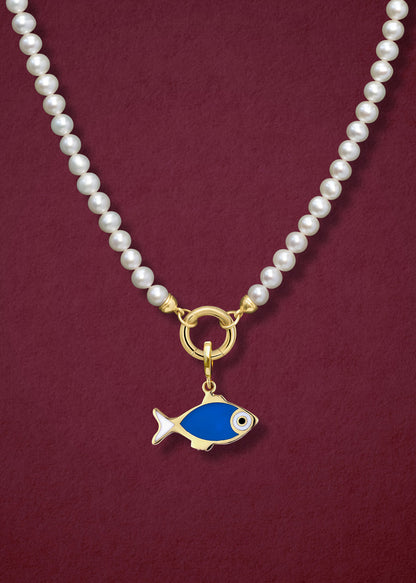 Close-up of the Lustrous Pearl Fishy Wishes Charm Necklace, featuring freshwater pearls, a golden link charm holder, and a fishy wishes charm in 14K solid gold by whywhy NYC.