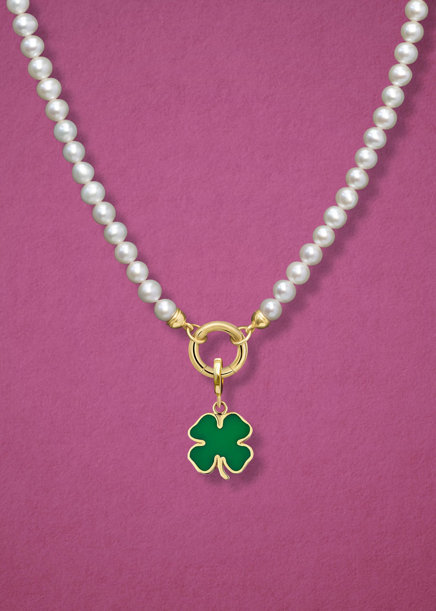 Close-up view of the Lustrous Pearl Lucky Clover Charm Necklace, featuring freshwater pearls, a golden link charm holder, and a lucky clover charm in 14K solid gold by whywhy NYC.