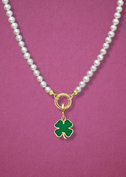 Close-up view of the Lustrous Pearl Lucky Clover Charm Necklace, featuring freshwater pearls, a golden link charm holder, and a lucky clover charm in 14K solid gold by whywhy NYC.
