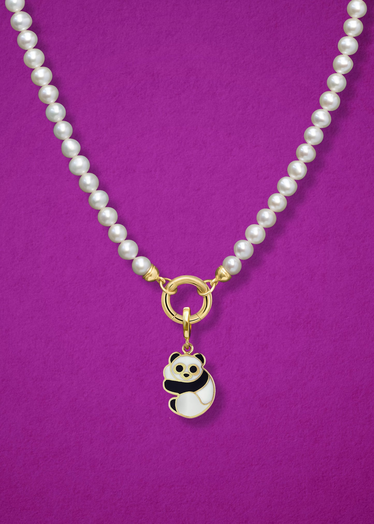 Close-up of the Panda Pals Charm paired with the Lustrous Pearl Charm Necklace by whywhy NYC, featuring 14K solid gold and freshwater pearls for a whimsical and elegant look.