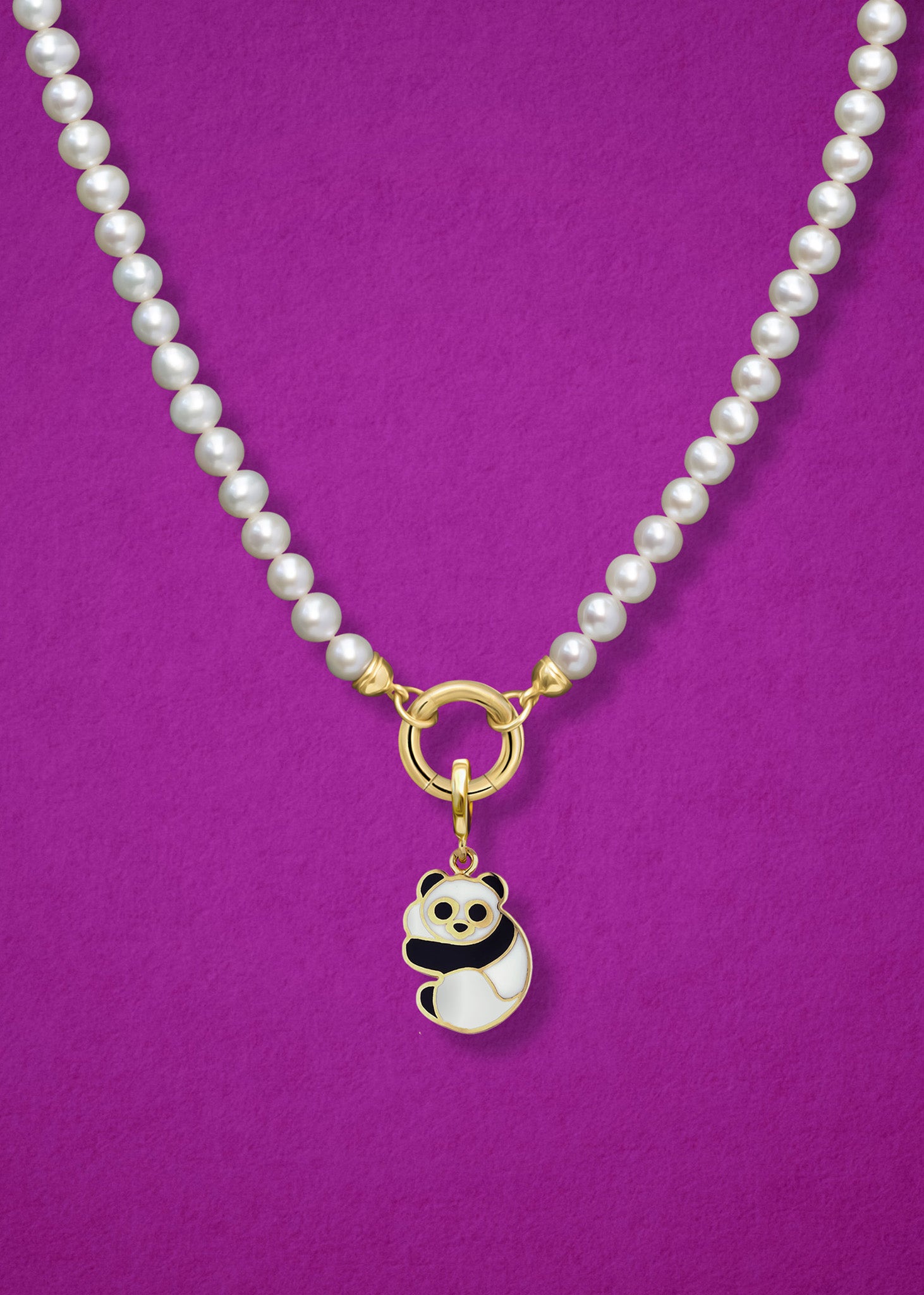 Close-up of the Panda Pals Charm paired with the Lustrous Pearl Charm Necklace by whywhy NYC, featuring 14K solid gold and freshwater pearls for a whimsical and elegant look.