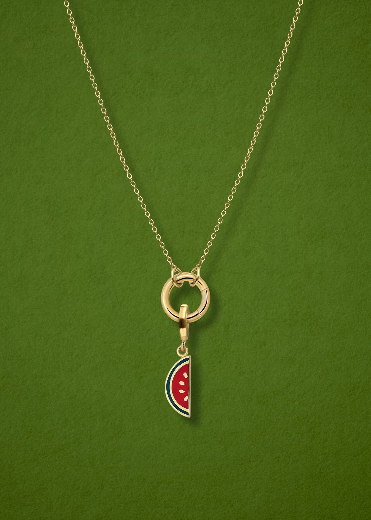 Close-up of the Watermelon Wonder Charm paired with the Golden Grace Cable Chain, crafted in 14K solid gold by whywhy NYC, for a fresh and playful jewelry look.