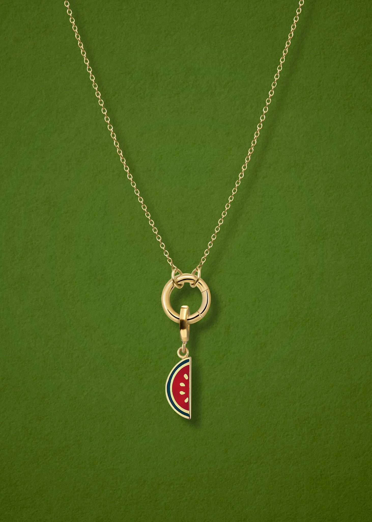 Close-up of the Watermelon Wonder Charm paired with the Golden Grace Cable Chain, crafted in 14K solid gold by whywhy NYC, for a fresh and playful jewelry look.