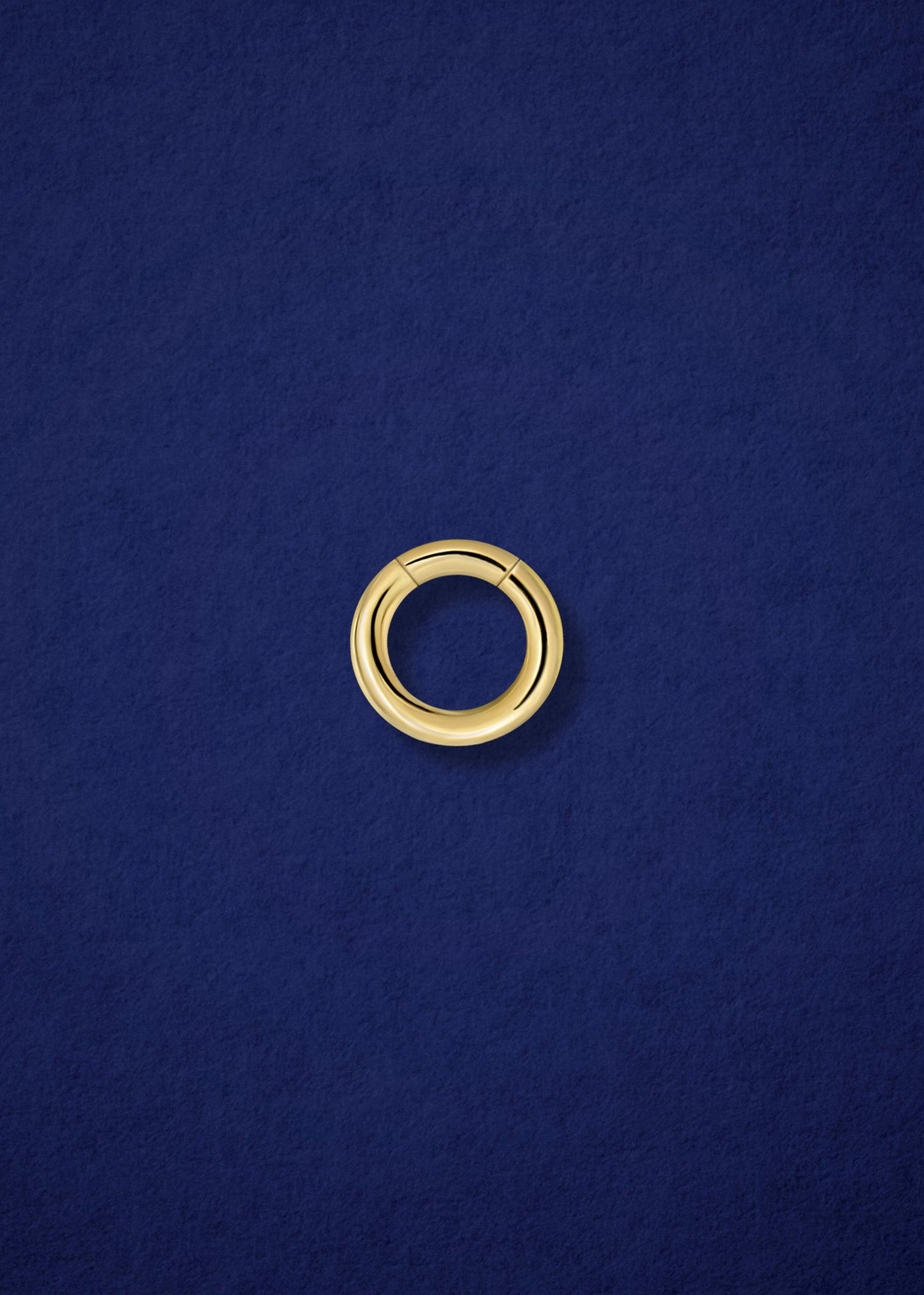 Closed 14K solid gold charm holder by whywhy NYC, designed for easy connection of necklaces and charms.