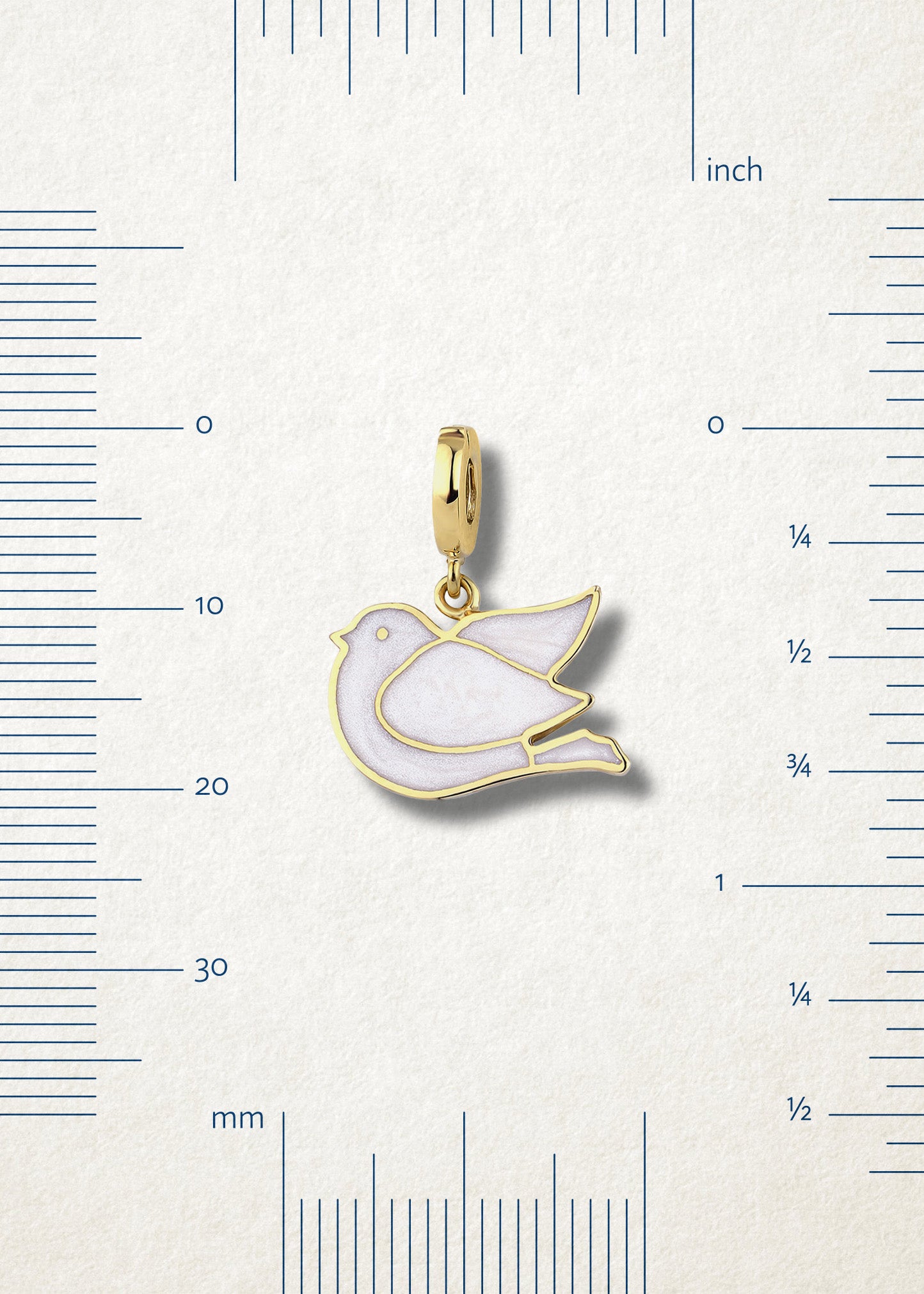 Measurement view of Dove of Hope Charm by whywhy NYC, 14K solid gold with white enamel, approximately 20mm in length.