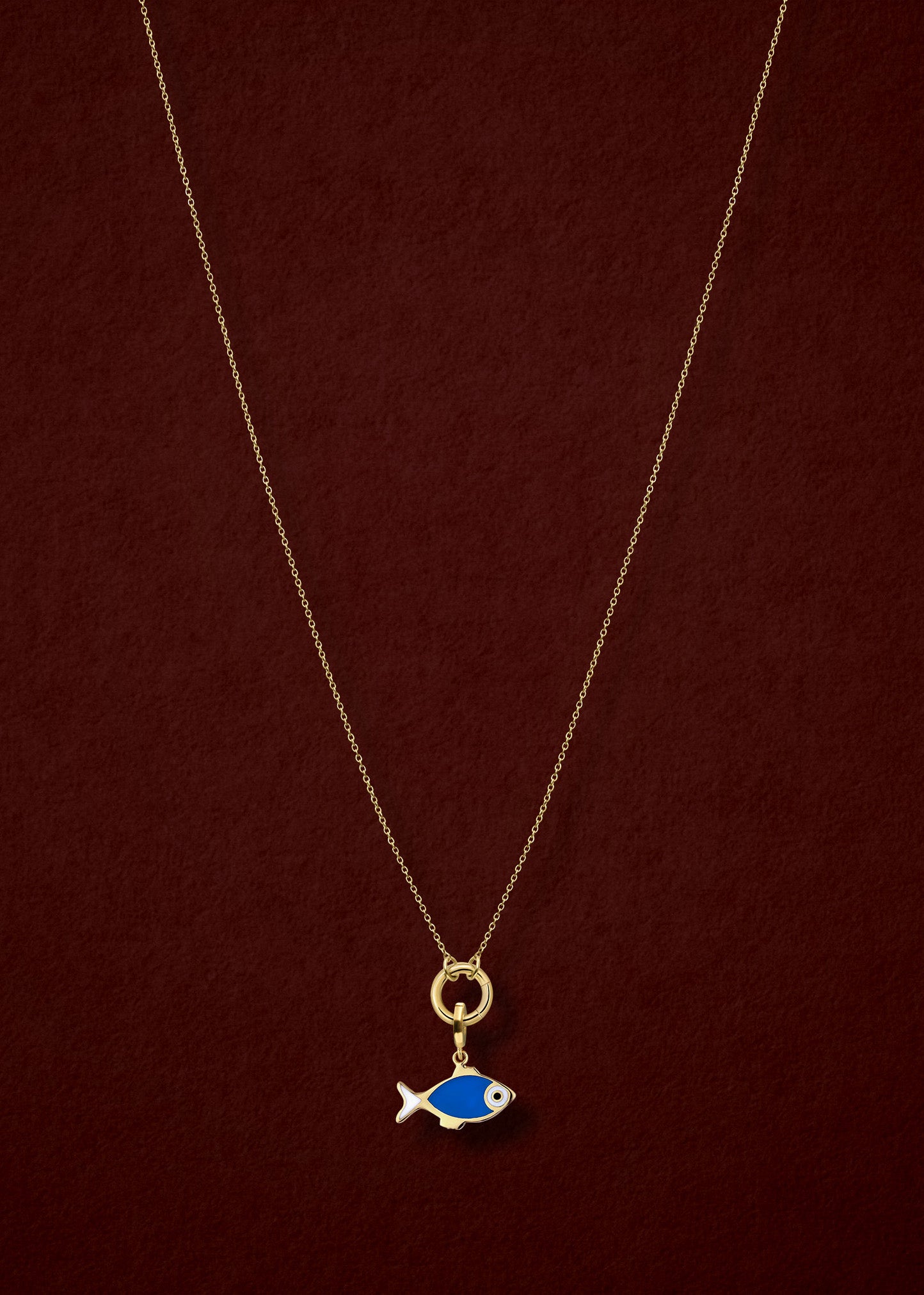 Golden Grace Fishy Wishes Charm Necklace in full view, showcasing a 14K solid gold cable chain, golden charm holder, and fishy wishes charm with vibrant enamel by whywhy NYC.
