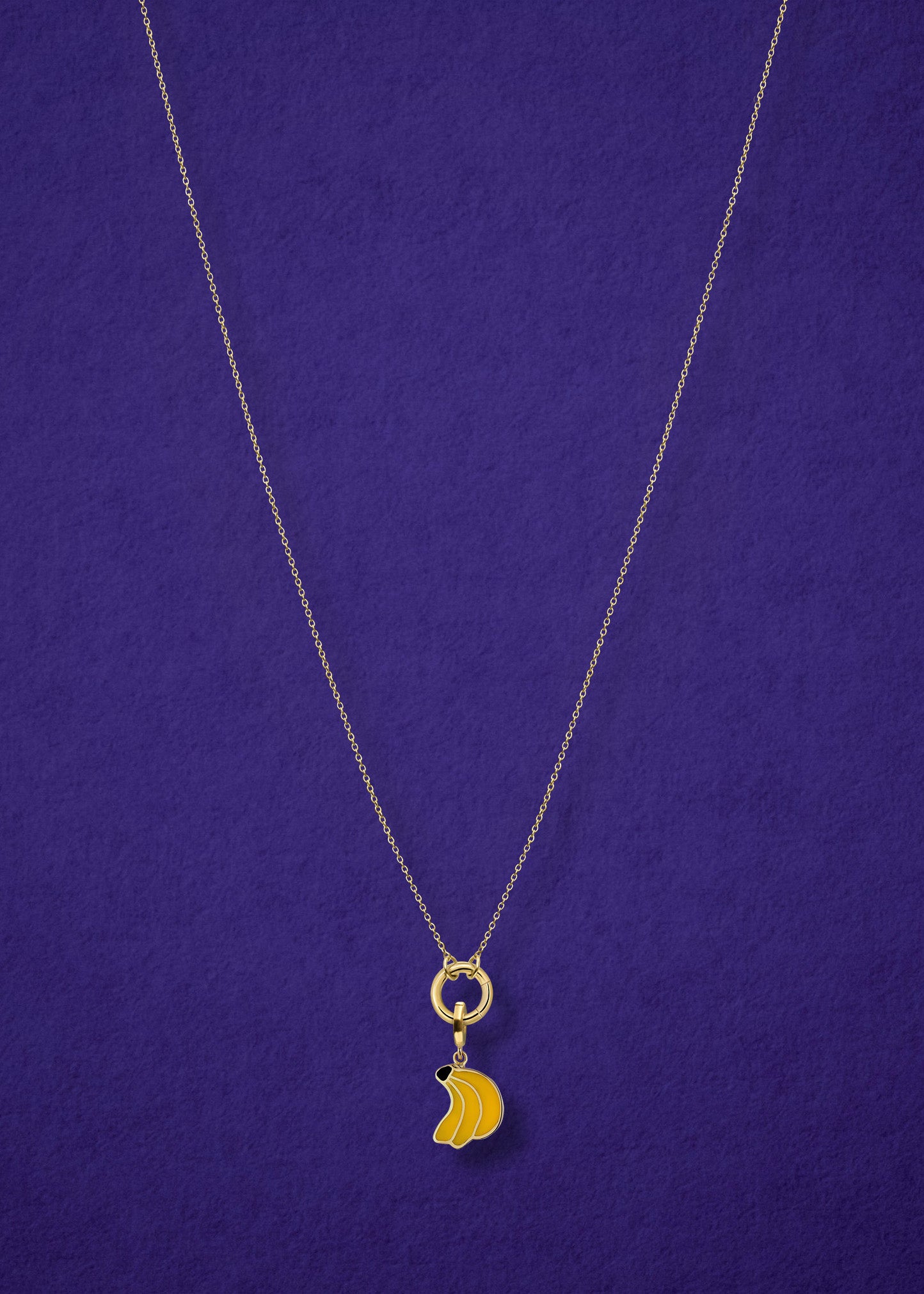 Golden Grace Banana Bliss Charm Necklace in full view, showcasing a 14K solid gold cable chain, golden link charm holder, and banana bliss charm with yellow enamel by whywhy NYC.