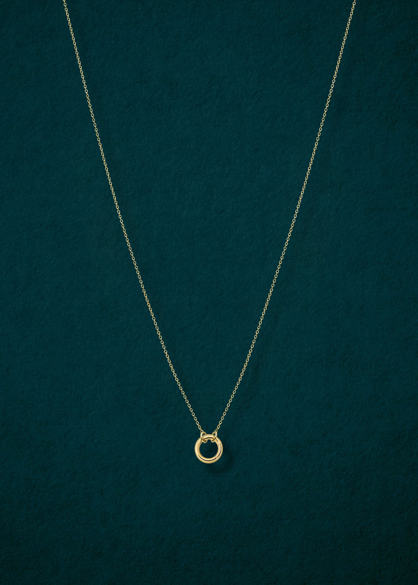 14K solid gold charm holder paired with the Golden Grace Cable Chain by whywhy NYC for bold charm styling.