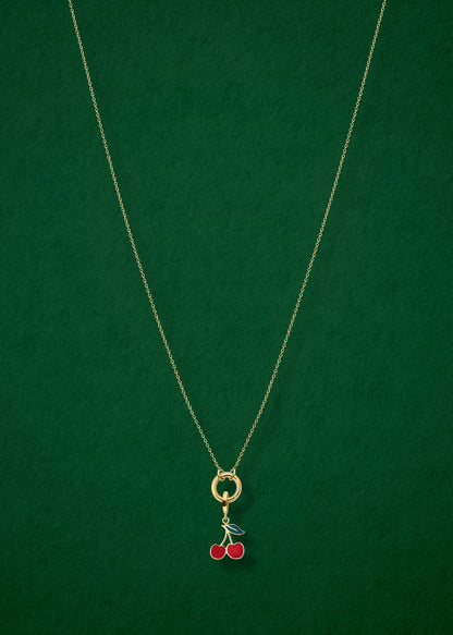 Golden Grace Cherry on Top Charm Necklace in full view, showcasing a 14K solid gold cable chain, golden link charm holder, and cherry on top charm with red enamel by whywhy NYC.