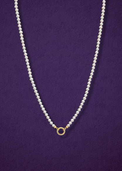 14K solid gold charm holder paired with the Lustrous Pearl Charm Necklace by whywhy NYC, perfect for elegant charm styling.