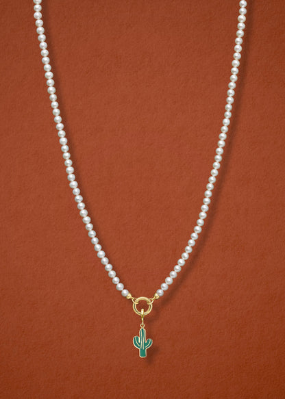 Lustrous Pearl Desert Bloom Charm Necklace in full view, showcasing pearls, a golden link charm holder, and a desert bloom charm in 14K solid gold by whywhy NYC.