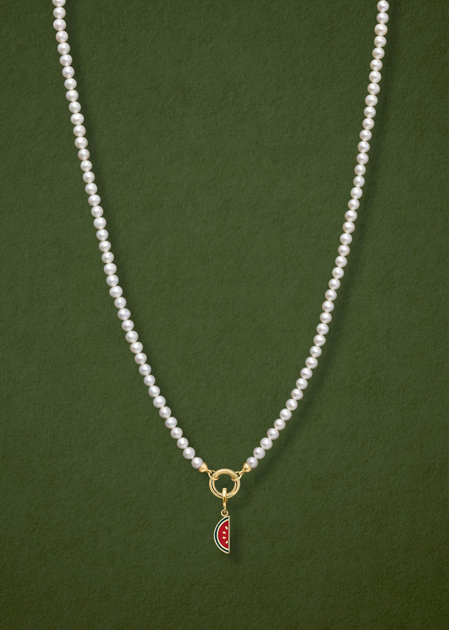 Lustrous Pearl Watermelon Wonder Charm Necklace in full view, showcasing pearls, a golden link charm holder, and a watermelon wonder charm in 14K solid gold by whywhy NYC.