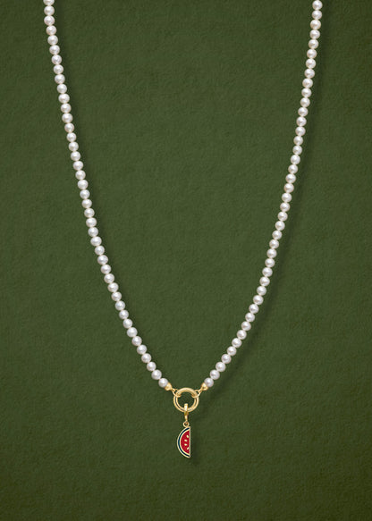 Lustrous Pearl Watermelon Wonder Charm Necklace in full view, showcasing pearls, a golden link charm holder, and a watermelon wonder charm in 14K solid gold by whywhy NYC.