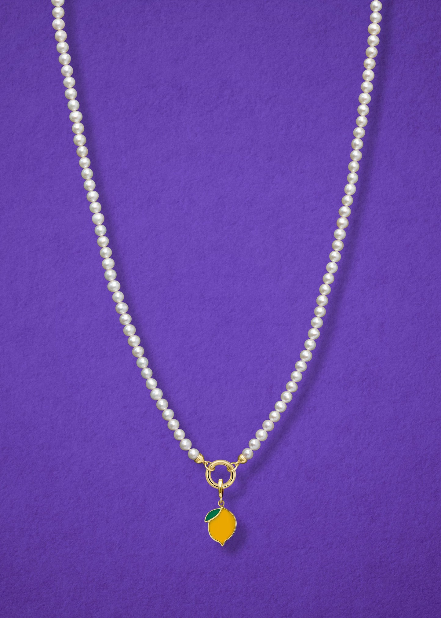 Lustrous Pearl Zesty Lemon Charm Necklace in full view, showcasing pearls, a golden link charm holder, and a zesty lemon charm in 14K solid gold by whywhy NYC.