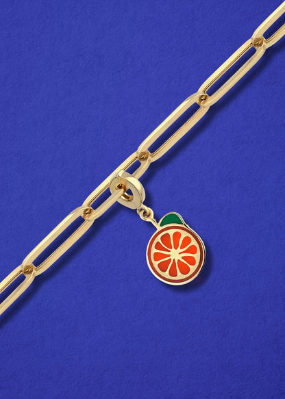 Orange Crush Charm in 14K gold and orange enamel on chain, citrus-inspired charm necklace by whywhy NYC.