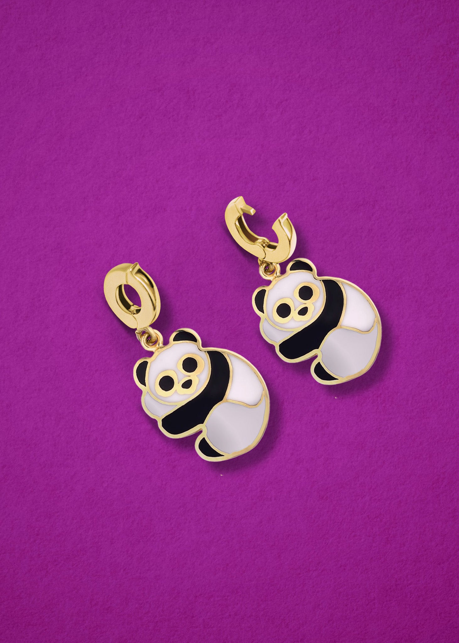 Panda Pals Charm showing both open and closed views of the 14K solid gold clip, with black and white enamel, displayed on a magenta background.